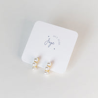 Pearl Huggie Earrings by Hey Blue Jaye