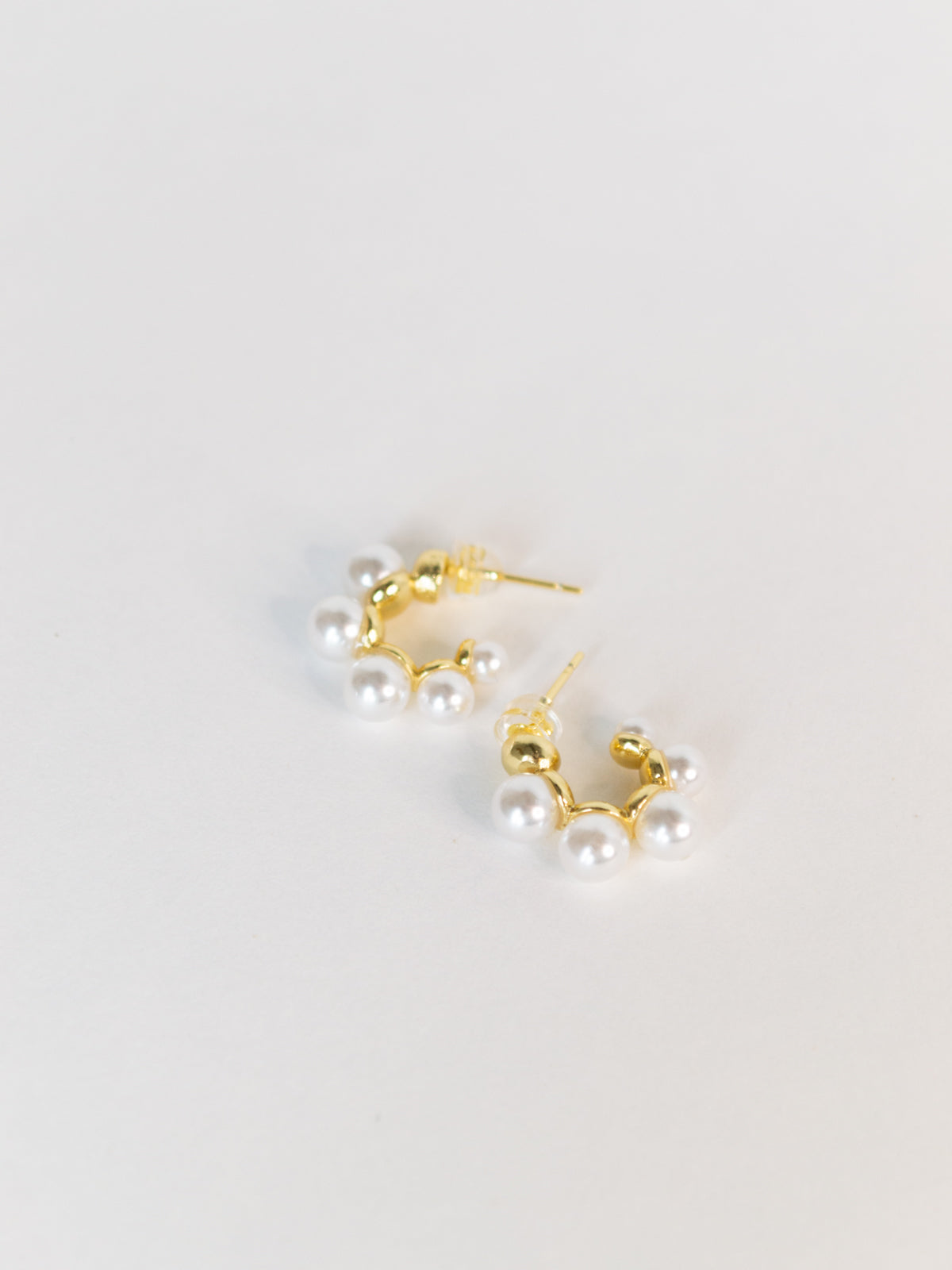 Pearl Huggie Earrings by Hey Blue Jaye